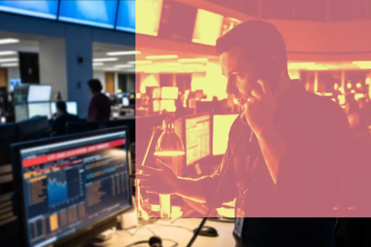Banking staff at desks on a trading and payments floor