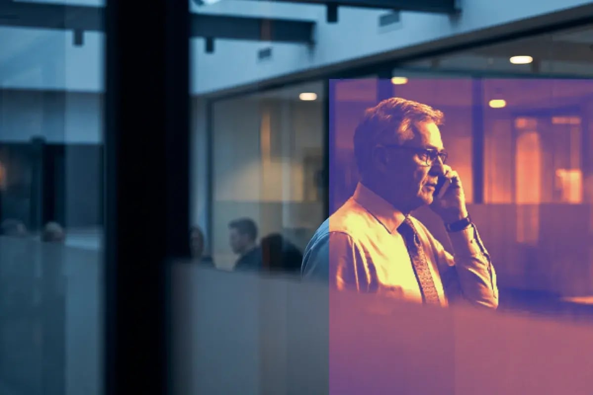 Government official taking a call in a meeting room