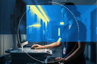 Clinician accessing patient records at a hospital workstation